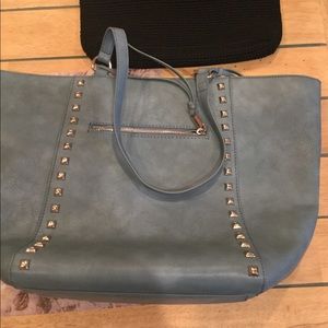 Denim colored shoulder bag.